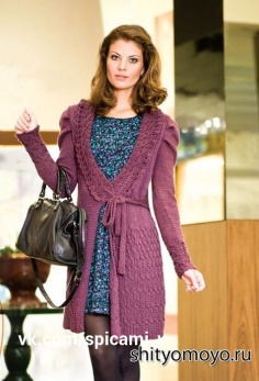 HE ORIGINAL CARDIGAN IS KNITTED WITH KNITTING NEEDLES AND A FANTASY PATTERN.